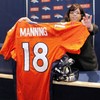 It's official: Manning signs for Denver Broncos