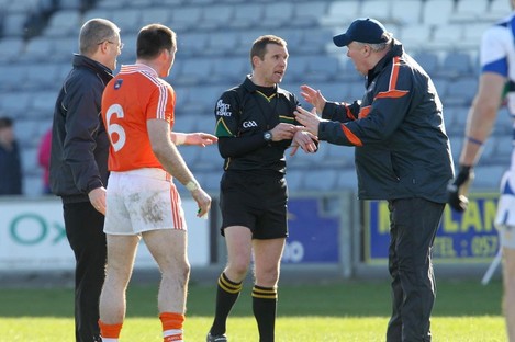 Assistant manager Paul Grimley appeals to referee Michael Duffy after sending off Ciaran McKeever before the start of the second half.