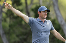 McIlroy stays alive as Johnson crashes out at WGC Match Play