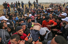 12 dead after clashes erupt as thousands of Gazans march near Israel border
