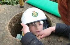 Boy rescued after getting stuck inside stone monument in park in England