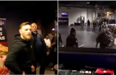Conor McGregor almost threw a railing into a bus as he reacted to being stripped of his UFC title