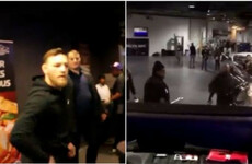 Conor McGregor almost threw a railing into a bus as he reacted to being stripped of his UFC title