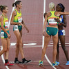 Australian athletes wait nearly four minutes to hug the last-place finisher in the 10,000m