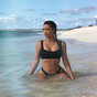 Kim K went paddleboarding this week, so people are making jokes about her looking for her lost earring