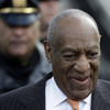 Bill Cosby's lawyers attack 'con artist' accusing him of sexual assault