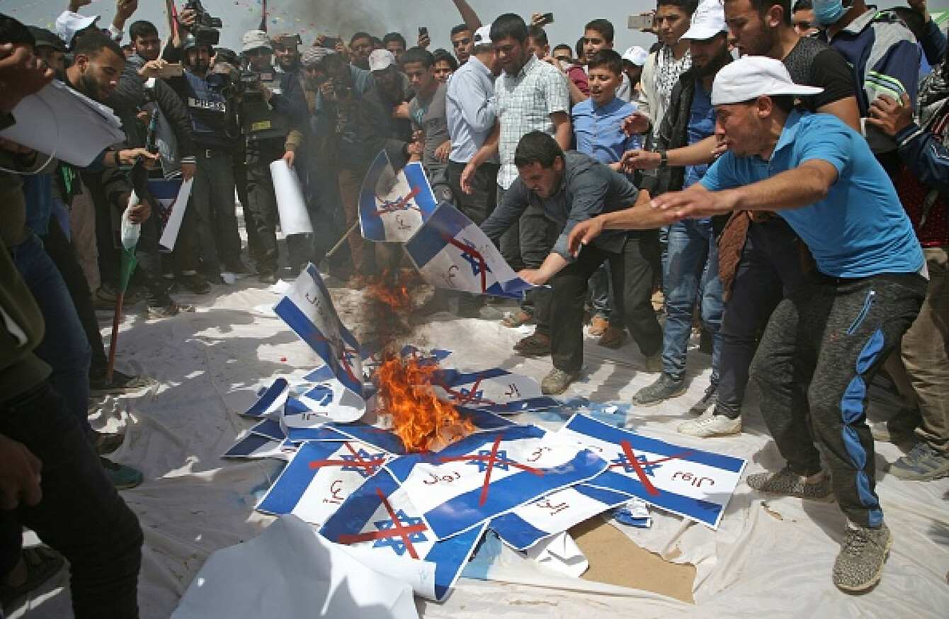 Tear gas and black smoke: Protesters are burning Israeli flags in Gaza