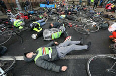 Cyclists stage lie-down protest outside Leinster House calling for greater road safety