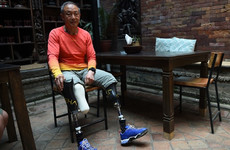 Double leg amputee reaches summit of Everest, 40 years after losing his feet during his first attempt
