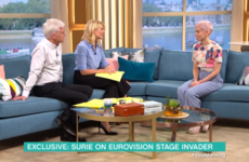 UK Eurovision singer SuRie told Phillip and Holly that the stage invader who stole her mic left her with bruises