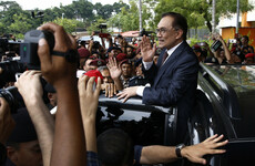 Scenes of joy and celebration as Malaysian politician jailed for sodomy is freed