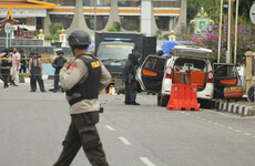 Men attack police headquarters with samurai swords in Indonesia days after suicide bombings