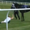 Presenter tackles horse, dusts herself down to deliver live preview of the next race