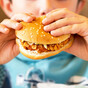 Children who watch extra junk food adverts consume more calories