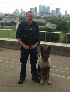 Police officer saves seven people - including mother and baby - from burning building