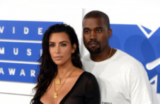 Kim Kardashian ate the head off a songwriter on Twitter after he came for Kanye West