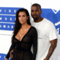 Kim Kardashian ate the head off a songwriter on Twitter after he came for Kanye West