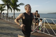 Lance Armstrong got pipped inches from the finish line of an Ironman race yesterday