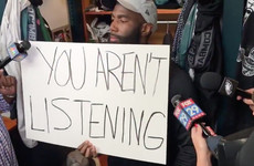 NFL player gives silent interview to media, holds up signs to support protests instead