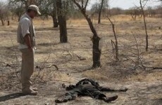 Why is George Clooney watching Sudan via satellite?