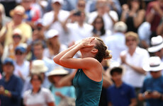 World number one Halep battles back to claim elusive first Grand Slam