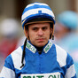 Former champion jockey left needing medical treatment after being struck in the face by fellow rider