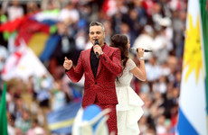Robbie Williams kicks off World Cup with obscene gesture