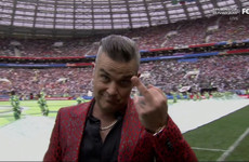 Fox have apologised for broadcasting Robbie Williams sticking up his middle finger at the World Cup