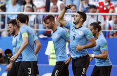 Uruguay top Group A as Suarez and Cavani fire them to victory over 10-man Russia