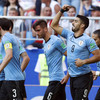 Uruguay top Group A as Suarez and Cavani fire them to victory over 10-man Russia