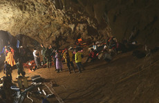 Rescuers battle heavy rain as search continues for 12 children trapped in cave in Thailand