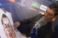 VIDEO: Cristiano Ronaldo left unimpressed by his caricature, signs it anyway
