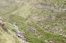 Dozens killed after overcrowded bus plunges off mountain road in India