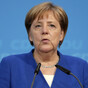 Merkel and minister reach late-night deal to avert government split