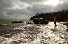 Six rescued after four men swam to save two girls drifting out to sea on airbed