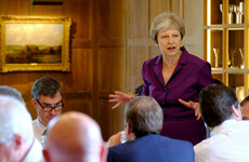 After a day-long private meeting, Theresa May's cabinet agrees to a 12-point Brexit position