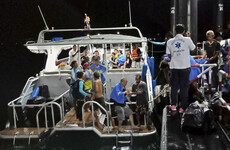 At least 10 dead and dozens missing as tourist boat sinks in Thailand