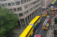 Traffic diversions in place as Dublin Fire Brigade attends scene of fire on city centre roof