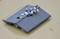 At least 20 dead as record Japan rains prompt mass evacuations