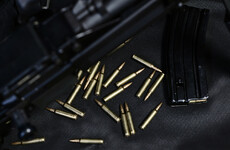 Two arrested after firearm and prescription tablets discovered