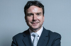 British minister resigns over lewd messages to women