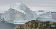 Greenland villagers moved to higher ground as vast iceberg threatens flooding