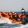 Father and sons saved by lifeboat after getting caught in rip current