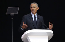 Obama warns of 'strange and uncertain times' during tribute to Nelson Mandela