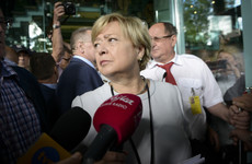 Poland's 'retired' top judge back at work as government tries to oust her