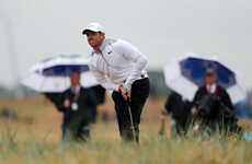 McIlroy well-placed for the weekend and determined to go down swinging