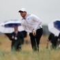 McIlroy well-placed for the weekend and determined to go down swinging