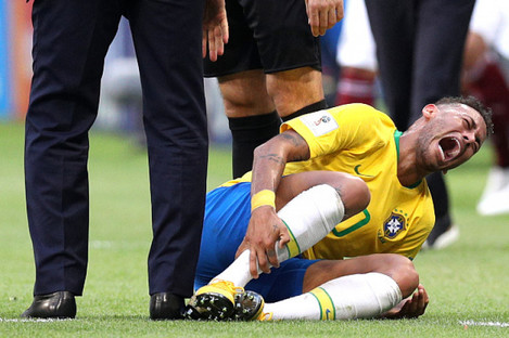 Neymar injured during Brazil's World Cup last 16 clash against Mexico.