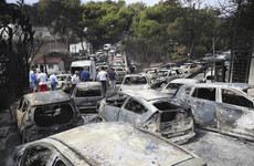 Flames ravage Greek seaside as wildfires kill 74