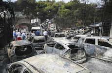 Flames ravage Greek seaside as wildfires kill 74